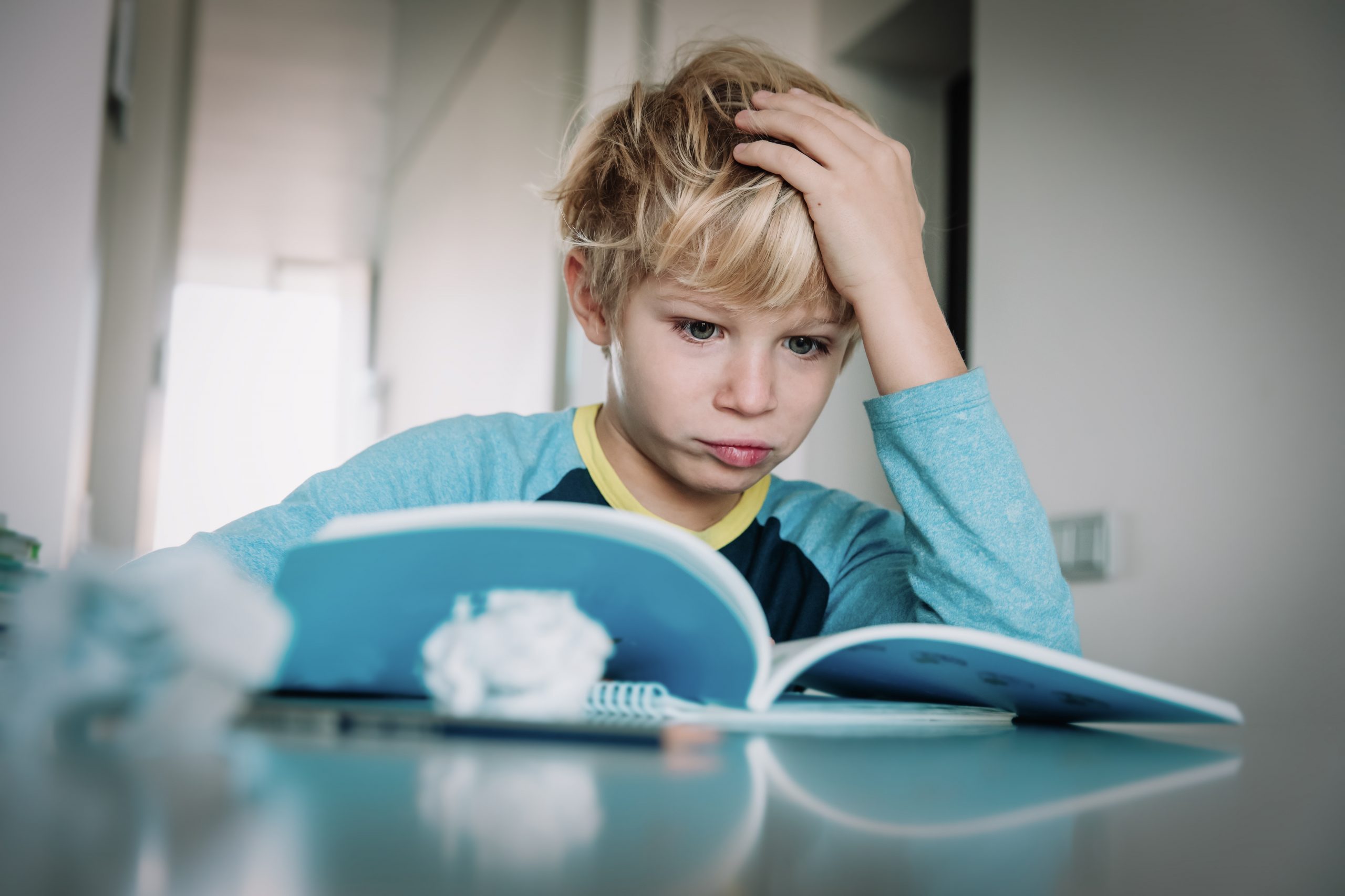 difficult homework- little boy stressed having problems with reading
